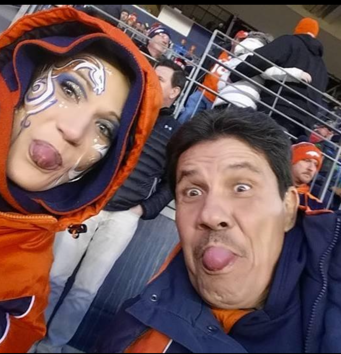 Me and my hero my father at a Denver bronco game